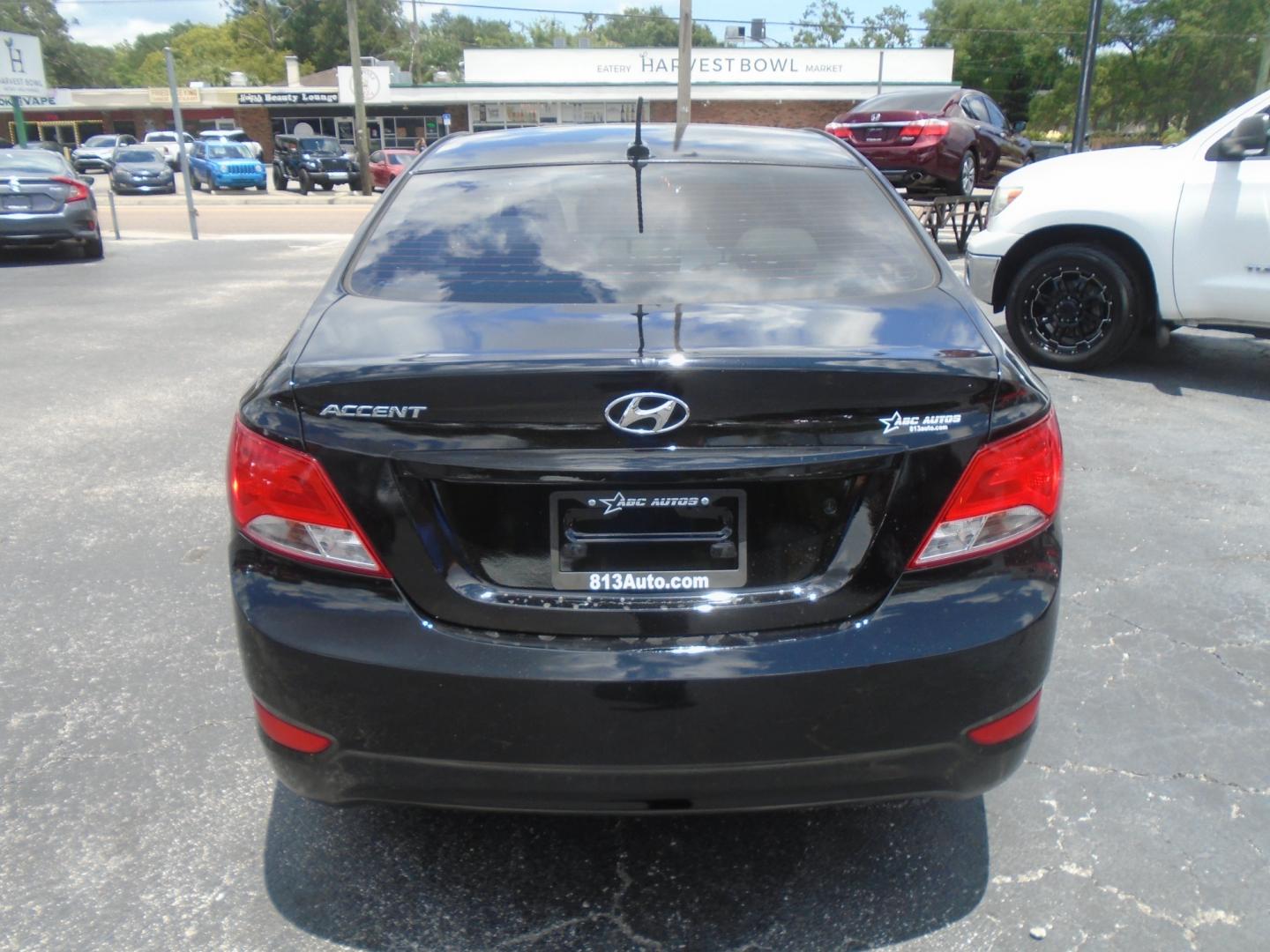 2015 Hyundai Accent GLS 4-Door 6A (KMHCT4AE9FU) with an 1.6L L4 DOHC 16V engine, 6-Speed Automatic transmission, located at 6112 N Florida Avenue, Tampa, FL, 33604, (888) 521-5131, 27.954929, -82.459534 - Photo#6