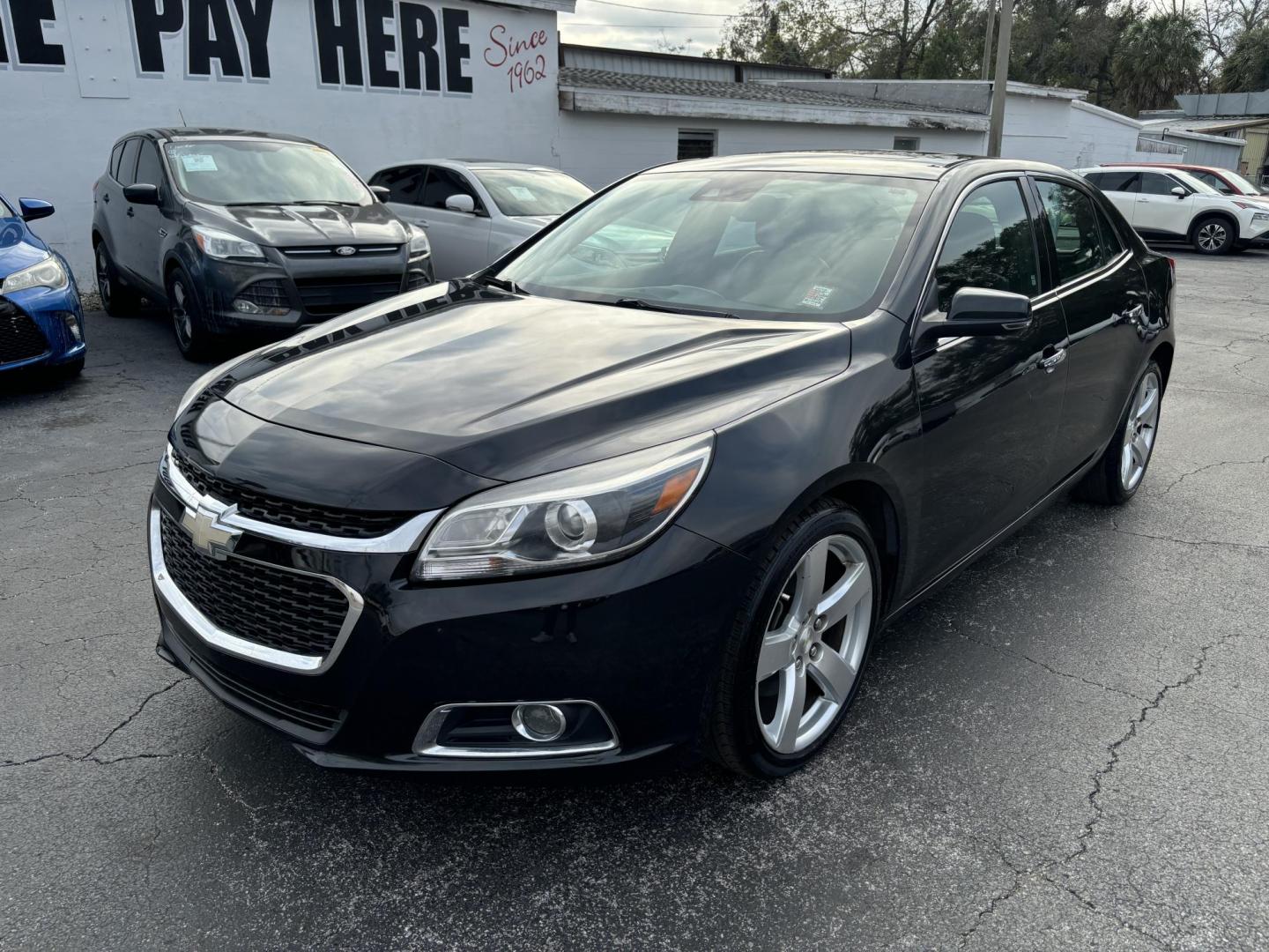 2014 Chevrolet Malibu 2LZ (1G11J5SX5EF) with an 2.0L L4 DOHC 16V engine, 6-Speed Automatic transmission, located at 6112 N Florida Avenue, Tampa, FL, 33604, (888) 521-5131, 27.954929, -82.459534 - Photo#2