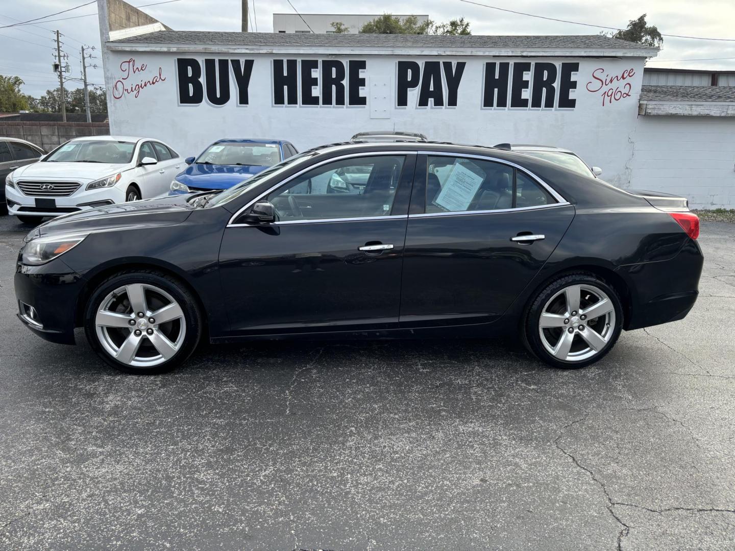 2014 Chevrolet Malibu 2LZ (1G11J5SX5EF) with an 2.0L L4 DOHC 16V engine, 6-Speed Automatic transmission, located at 6112 N Florida Avenue, Tampa, FL, 33604, (888) 521-5131, 27.954929, -82.459534 - Photo#0