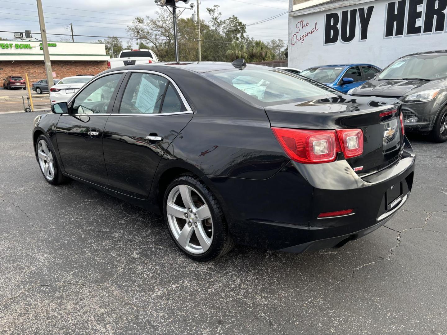 2014 Chevrolet Malibu 2LZ (1G11J5SX5EF) with an 2.0L L4 DOHC 16V engine, 6-Speed Automatic transmission, located at 6112 N Florida Avenue, Tampa, FL, 33604, (888) 521-5131, 27.954929, -82.459534 - Photo#4