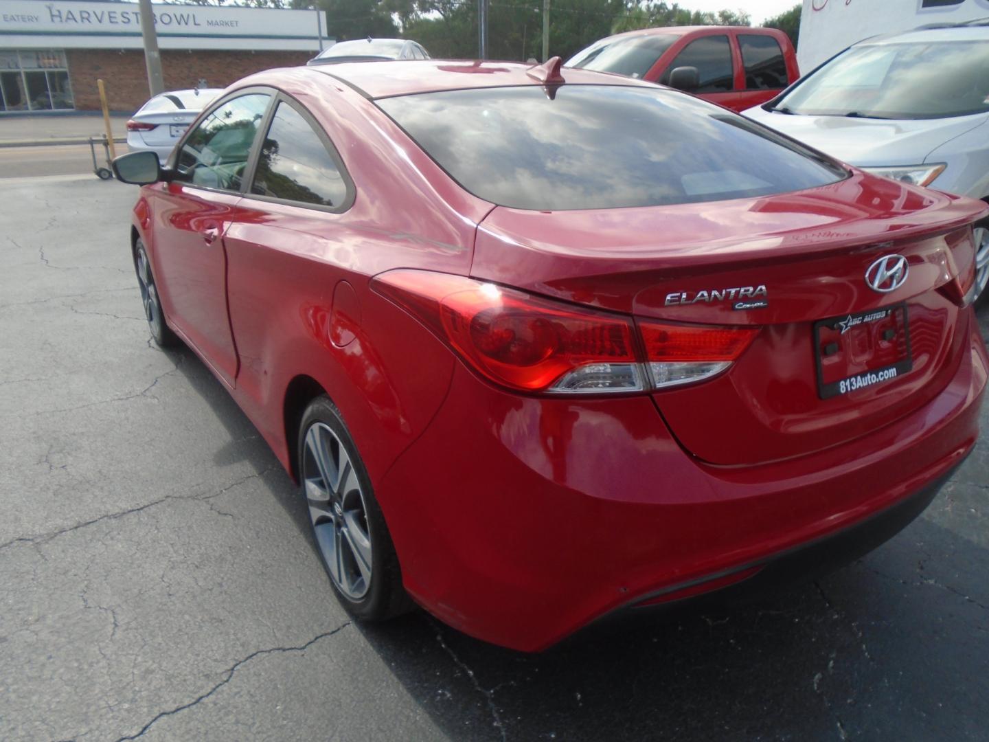 2013 Hyundai Elantra GS Coupe A/T (KMHDH6AE2DU) with an 1.8L L4 DOHC 16V engine, 6-Speed Automatic transmission, located at 6112 N Florida Avenue, Tampa, FL, 33604, (888) 521-5131, 27.954929, -82.459534 - Photo#4