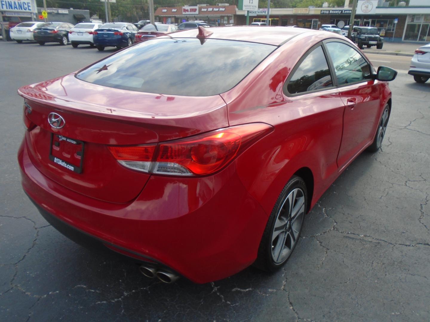 2013 Hyundai Elantra GS Coupe A/T (KMHDH6AE2DU) with an 1.8L L4 DOHC 16V engine, 6-Speed Automatic transmission, located at 6112 N Florida Avenue, Tampa, FL, 33604, (888) 521-5131, 27.954929, -82.459534 - Photo#5