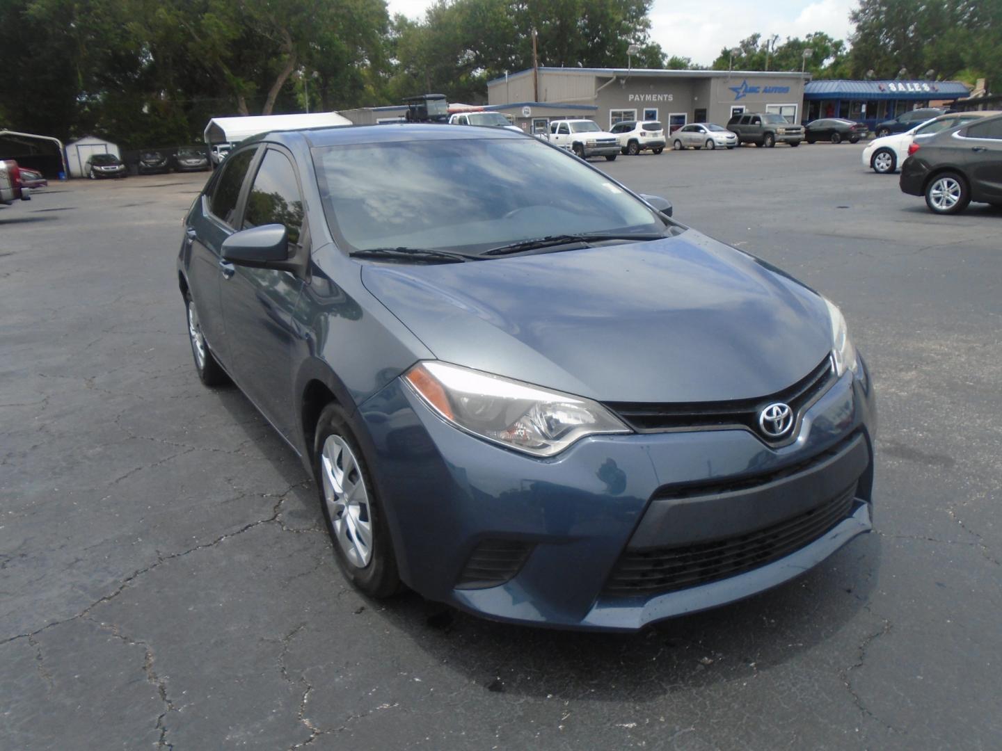 2016 Toyota Corolla L 4-Speed AT (5YFBURHE9GP) with an 1.8L L4 DOHC 16V engine, 4A transmission, located at 6112 N Florida Avenue, Tampa, FL, 33604, (888) 521-5131, 27.954929, -82.459534 - Photo#2