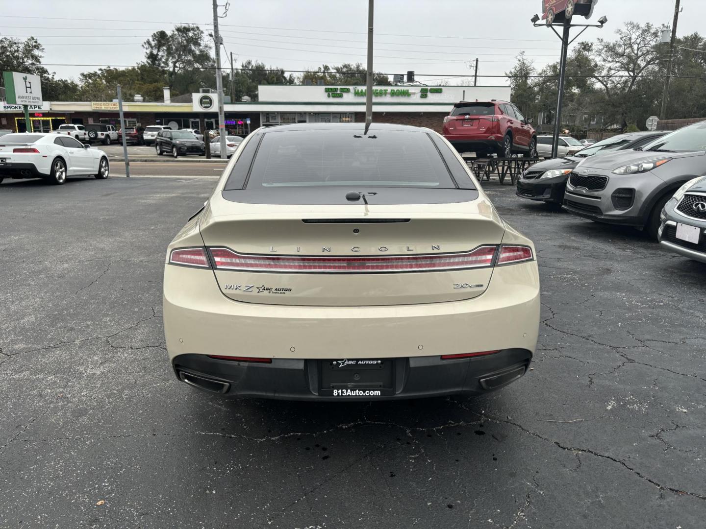 2015 Lincoln MKZ FWD (3LN6L2G91FR) with an 2.0L L4 DOHC 16V engine, 6-Speed Automatic transmission, located at 6112 N Florida Avenue, Tampa, FL, 33604, (888) 521-5131, 27.954929, -82.459534 - Photo#5