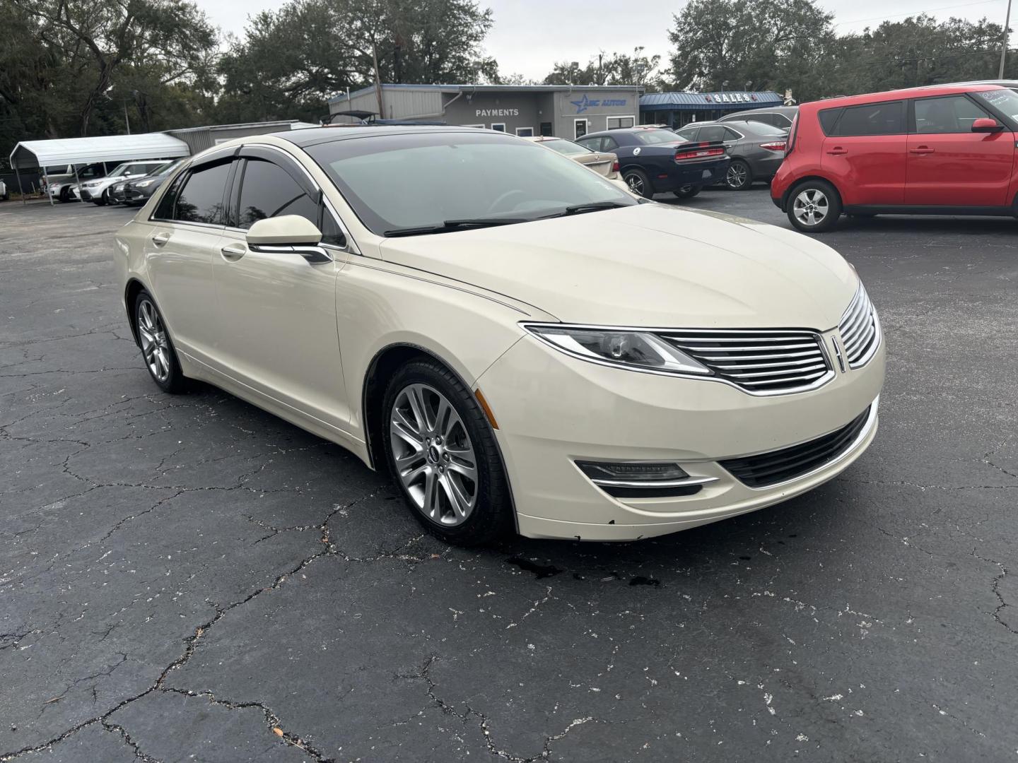 2015 Lincoln MKZ FWD (3LN6L2G91FR) with an 2.0L L4 DOHC 16V engine, 6-Speed Automatic transmission, located at 6112 N Florida Avenue, Tampa, FL, 33604, (888) 521-5131, 27.954929, -82.459534 - Photo#3