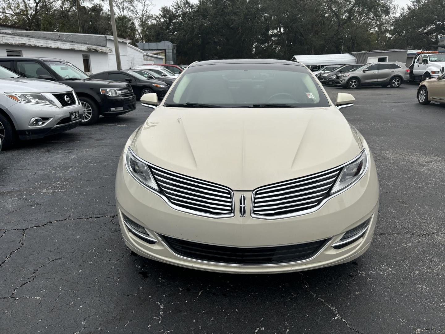 2015 Lincoln MKZ FWD (3LN6L2G91FR) with an 2.0L L4 DOHC 16V engine, 6-Speed Automatic transmission, located at 6112 N Florida Avenue, Tampa, FL, 33604, (888) 521-5131, 27.954929, -82.459534 - Photo#1