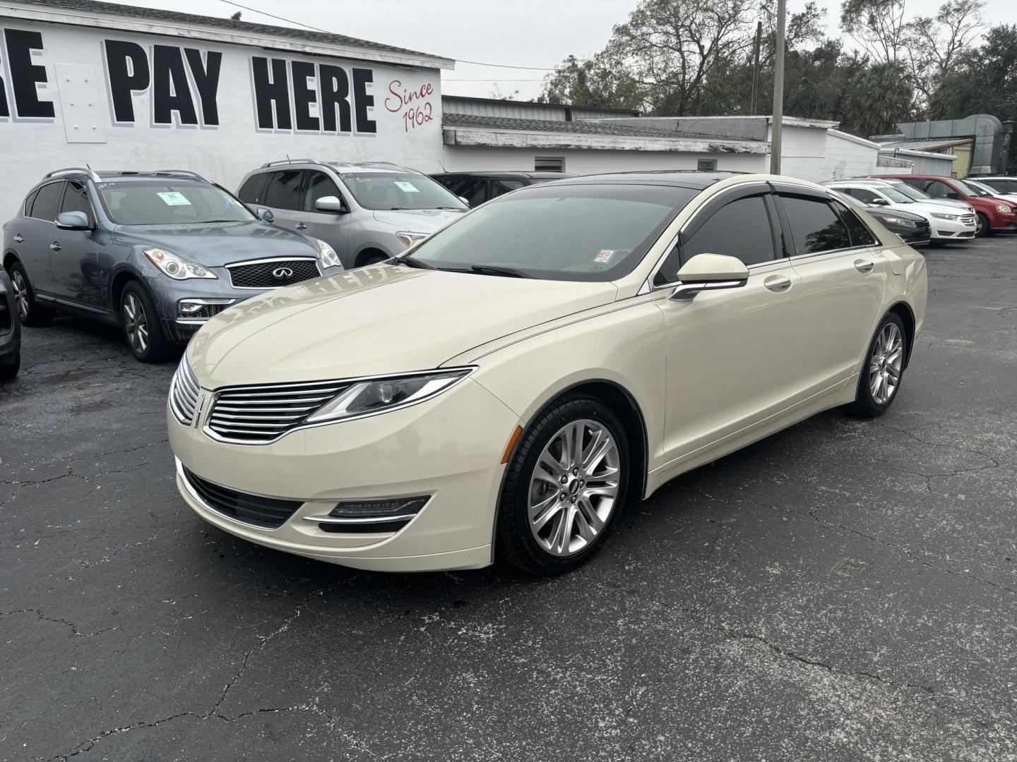 2015 Lincoln MKZ FWD (3LN6L2G91FR) with an 2.0L L4 DOHC 16V engine, 6-Speed Automatic transmission, located at 6112 N Florida Avenue, Tampa, FL, 33604, (888) 521-5131, 27.954929, -82.459534 - Photo#2