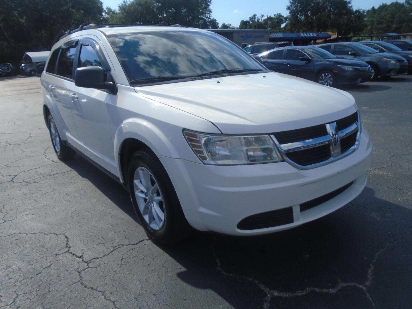 2010 Dodge Journey SE (3D4PG4FB5AT) with an 2.4L L4 DOHC 16V engine, 4-Speed Automatic transmission, located at 6112 N Florida Avenue, Tampa, FL, 33604, (888) 521-5131, 27.954929, -82.459534 - Photo#2