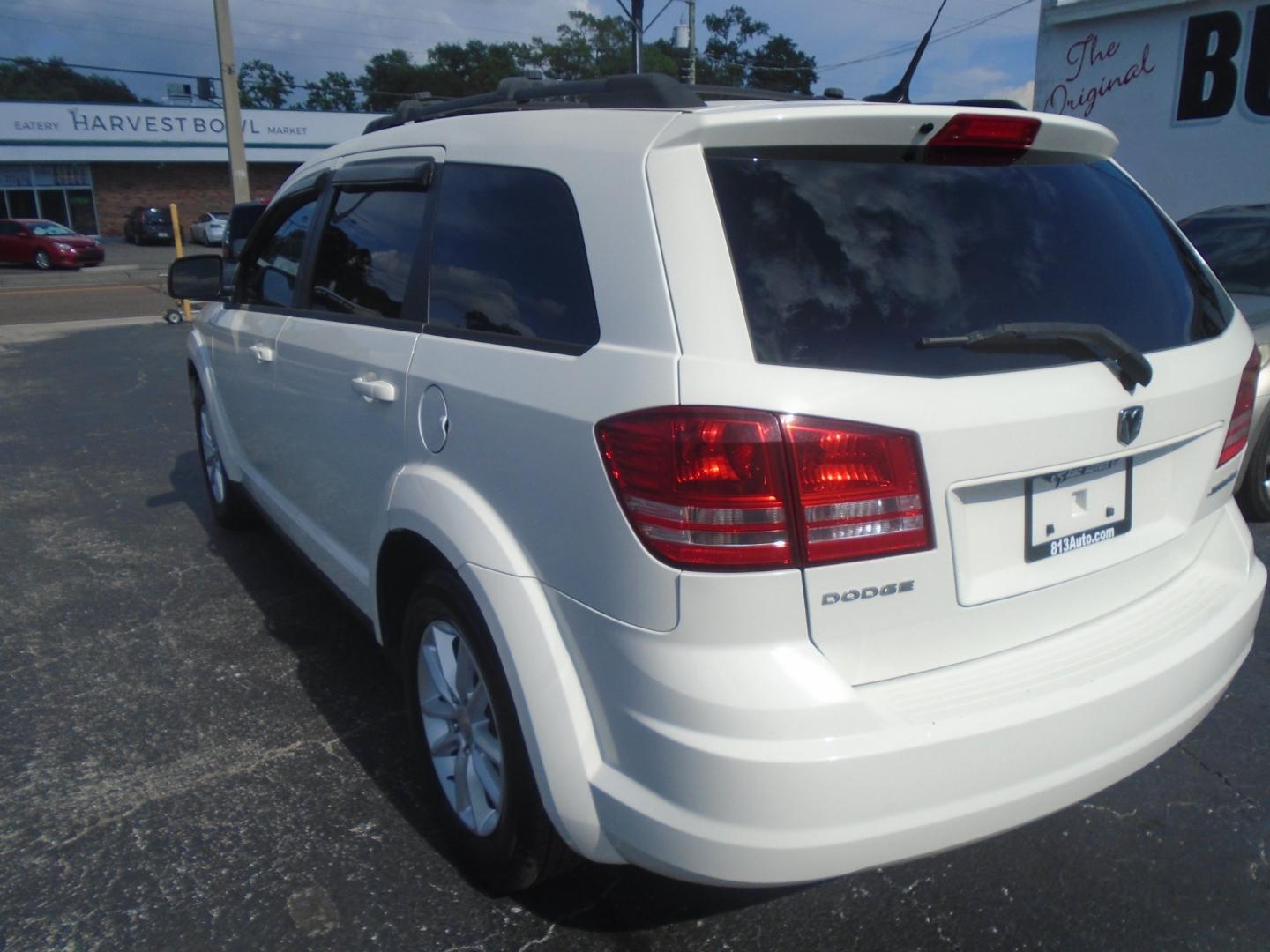 2010 Dodge Journey SE (3D4PG4FB5AT) with an 2.4L L4 DOHC 16V engine, 4-Speed Automatic transmission, located at 6112 N Florida Avenue, Tampa, FL, 33604, (888) 521-5131, 27.954929, -82.459534 - Photo#4