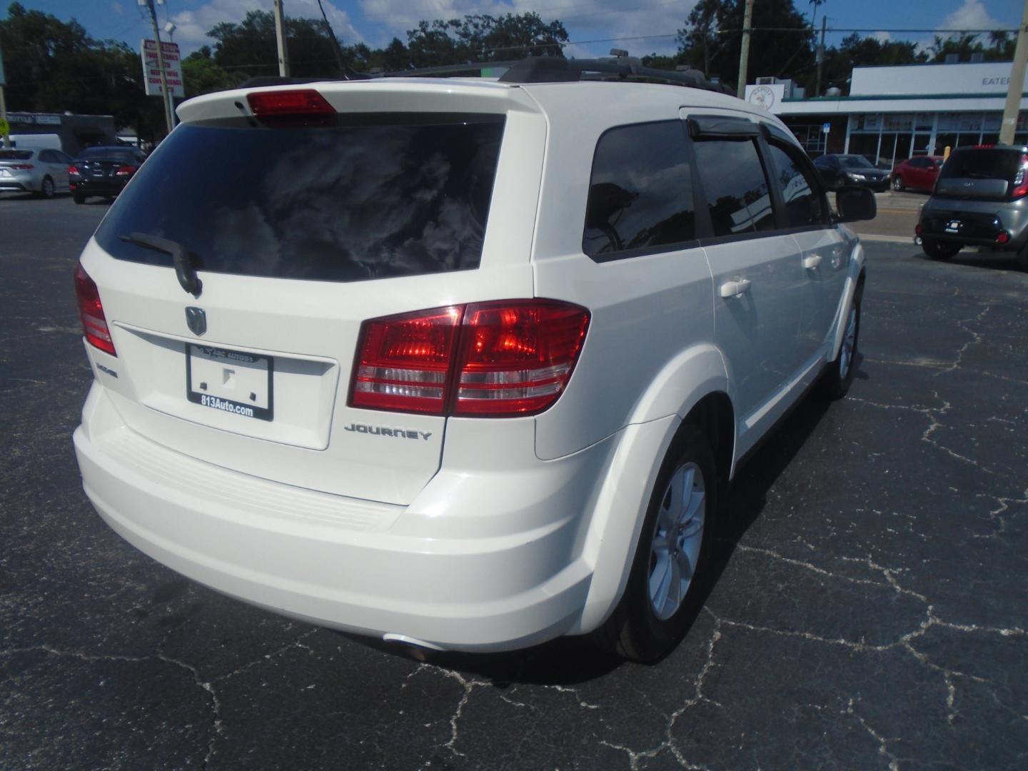 2010 Dodge Journey SE (3D4PG4FB5AT) with an 2.4L L4 DOHC 16V engine, 4-Speed Automatic transmission, located at 6112 N Florida Avenue, Tampa, FL, 33604, (888) 521-5131, 27.954929, -82.459534 - Photo#5