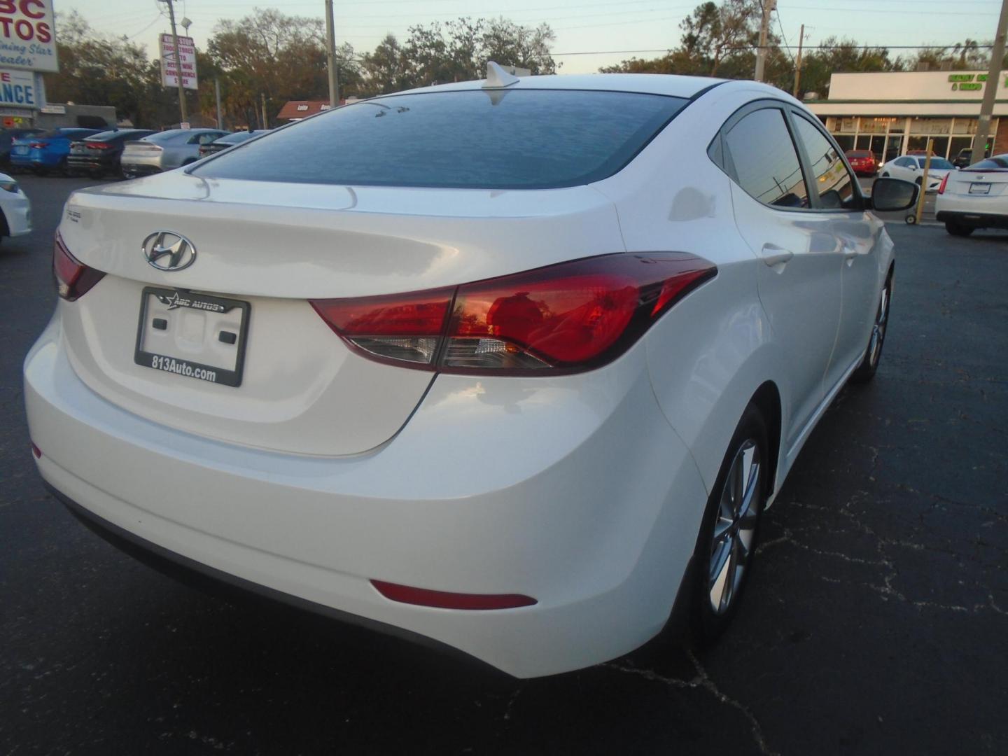 2015 Hyundai Elantra Limited (5NPDH4AE9FH) with an 1.8L L4 DOHC 16V engine, 6-Speed Automatic transmission, located at 6112 N Florida Avenue, Tampa, FL, 33604, (888) 521-5131, 27.954929, -82.459534 - Photo#4