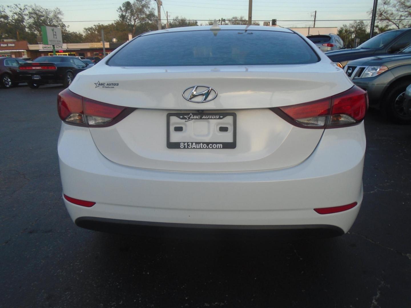 2015 Hyundai Elantra Limited (5NPDH4AE9FH) with an 1.8L L4 DOHC 16V engine, 6-Speed Automatic transmission, located at 6112 N Florida Avenue, Tampa, FL, 33604, (888) 521-5131, 27.954929, -82.459534 - Photo#3