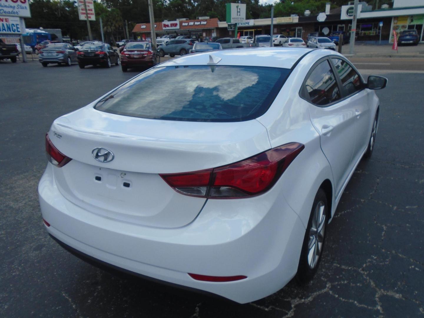 2015 White /Grey Hyundai Elantra Limited (5NPDH4AE9FH) with an 1.8L L4 DOHC 16V engine, 6-Speed Automatic transmission, located at 6112 N Florida Avenue, Tampa, FL, 33604, (888) 521-5131, 27.954929, -82.459534 - 499$ DOWN PLUS TAX & TAG. - Photo#11