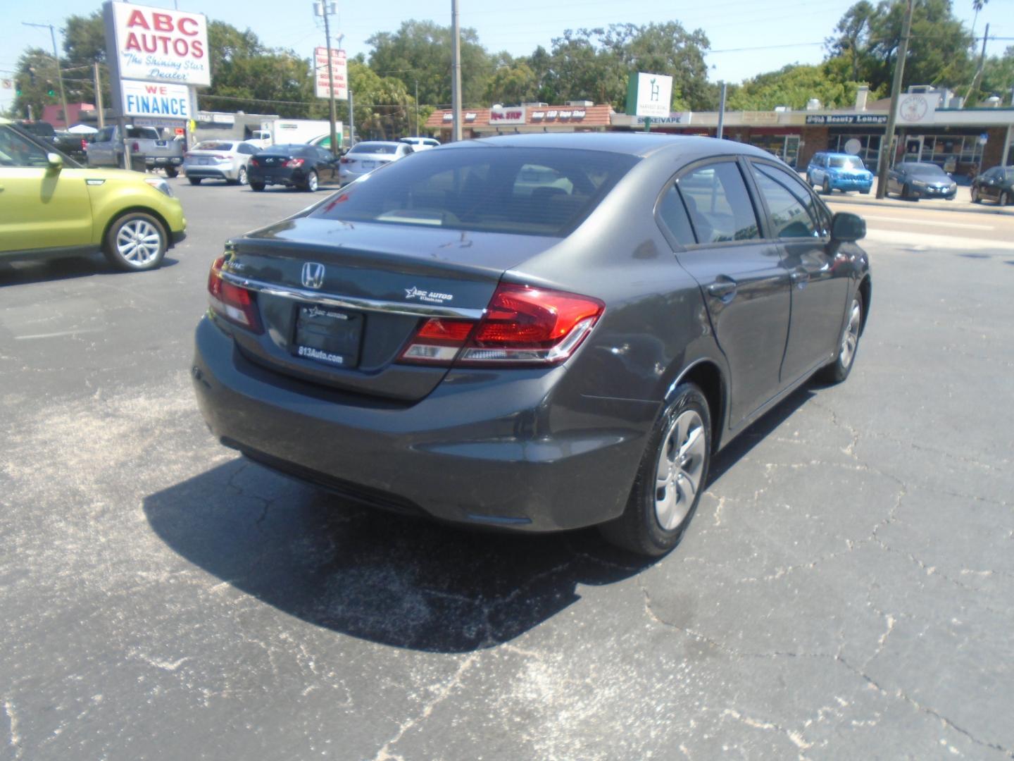 2013 Honda Civic LX Sedan 5-Speed AT (19XFB2F58DE) with an 1.8L L4 SOHC 16V engine, 5-Speed Automatic transmission, located at 6112 N Florida Avenue, Tampa, FL, 33604, (888) 521-5131, 27.954929, -82.459534 - Photo#4