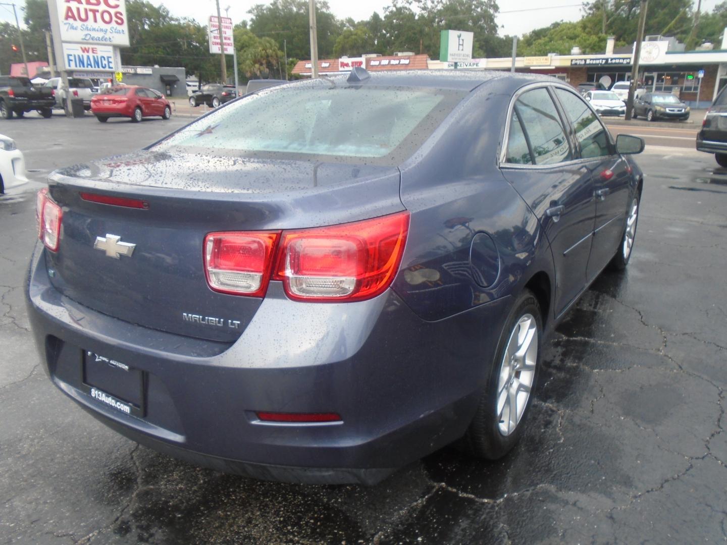 2014 Chevrolet Malibu 1LT (1G11C5SL3EF) with an 2.5L L4 DOHC 16V engine, 6-Speed Automatic transmission, located at 6112 N Florida Avenue, Tampa, FL, 33604, (888) 521-5131, 27.954929, -82.459534 - Photo#3