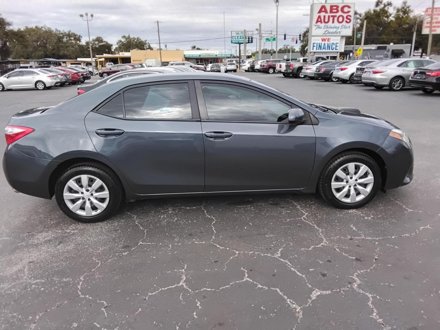 2015 Blue /Grey Toyota Corolla L 4-Speed AT (2T1BURHE8FC) with an 1.8L L4 DOHC 16V engine, 4-Speed Automatic transmission, located at 6112 N Florida Avenue, Tampa, FL, 33604, (888) 521-5131, 27.954929, -82.459534 - 499$ down plus tax & tag. - Photo#5