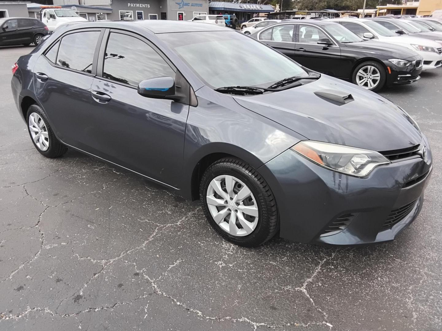 2015 Blue /Grey Toyota Corolla L 4-Speed AT (2T1BURHE8FC) with an 1.8L L4 DOHC 16V engine, 4-Speed Automatic transmission, located at 6112 N Florida Avenue, Tampa, FL, 33604, (888) 521-5131, 27.954929, -82.459534 - 499$ down plus tax & tag. - Photo#4
