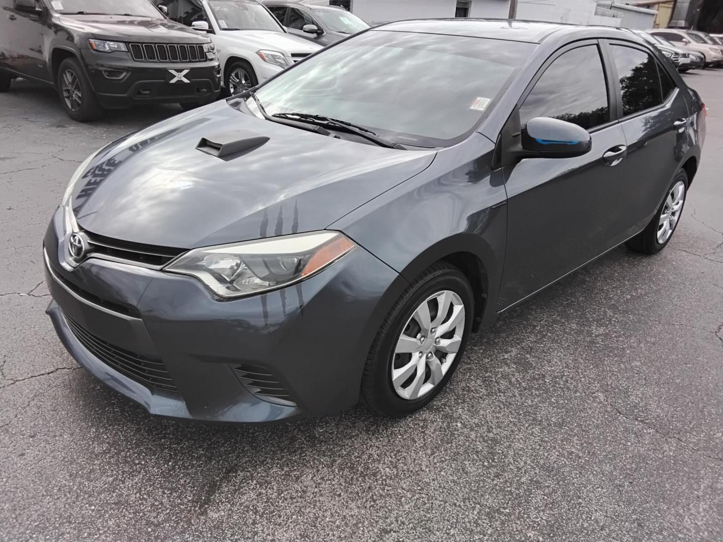 2015 Blue /Grey Toyota Corolla L 4-Speed AT (2T1BURHE8FC) with an 1.8L L4 DOHC 16V engine, 4-Speed Automatic transmission, located at 6112 N Florida Avenue, Tampa, FL, 33604, (888) 521-5131, 27.954929, -82.459534 - 499$ down plus tax & tag. - Photo#2