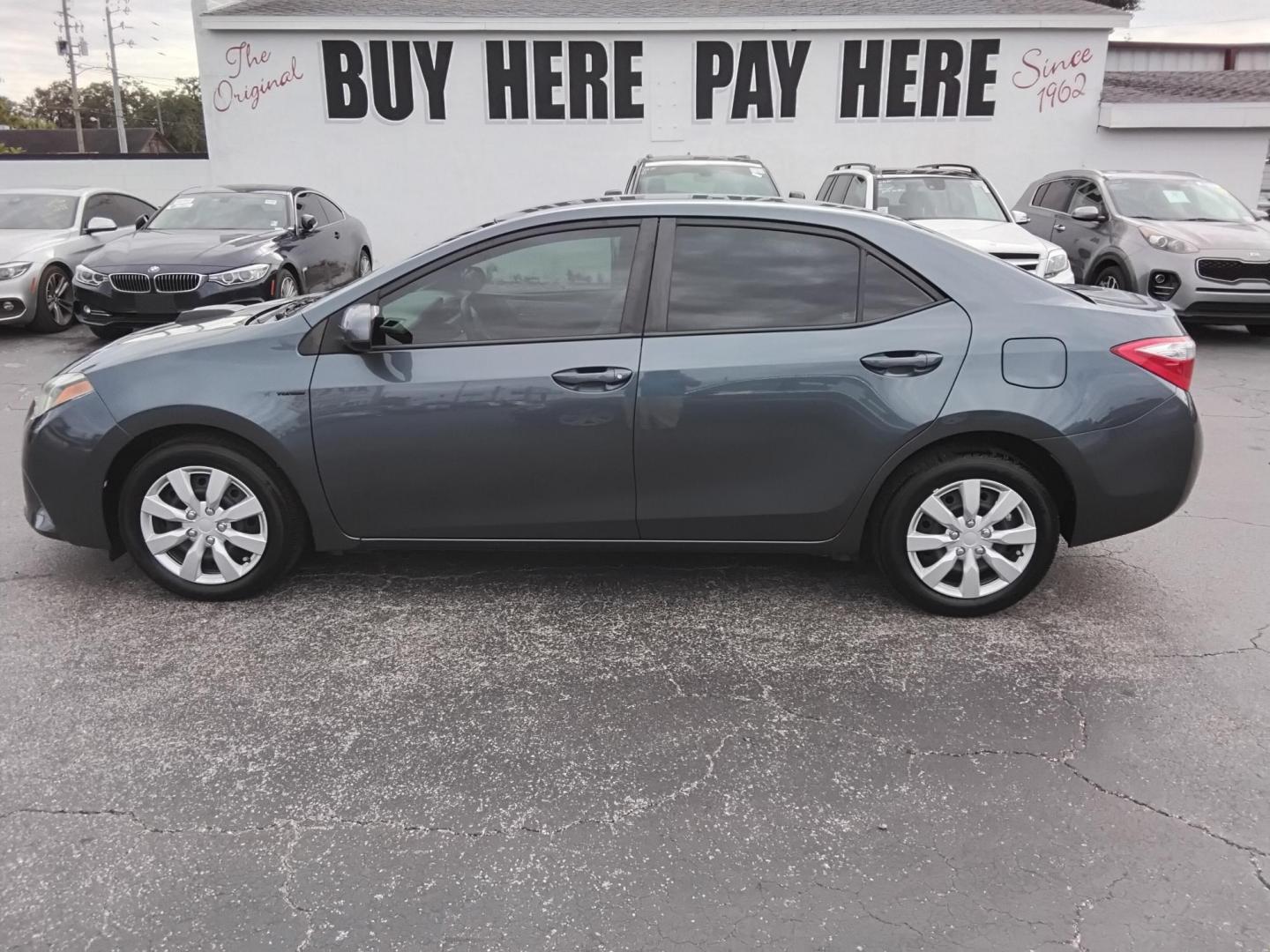 2015 Blue /Grey Toyota Corolla L 4-Speed AT (2T1BURHE8FC) with an 1.8L L4 DOHC 16V engine, 4-Speed Automatic transmission, located at 6112 N Florida Avenue, Tampa, FL, 33604, (888) 521-5131, 27.954929, -82.459534 - 499$ down plus tax & tag. - Photo#0
