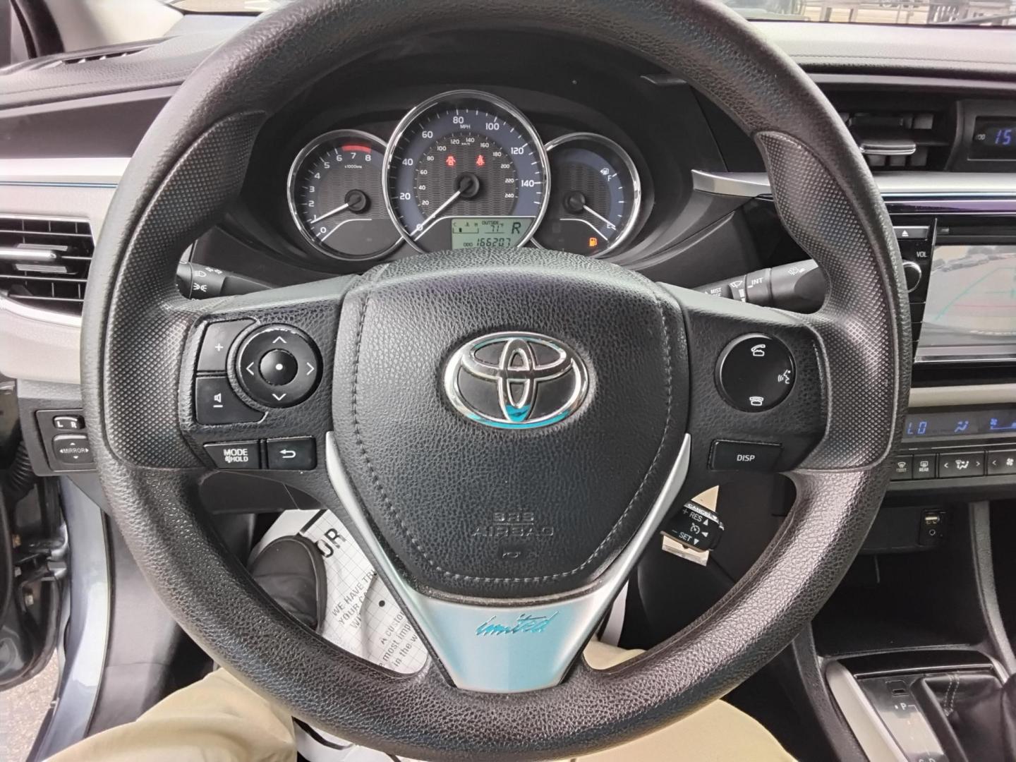 2015 Blue /Grey Toyota Corolla L 4-Speed AT (2T1BURHE8FC) with an 1.8L L4 DOHC 16V engine, 4-Speed Automatic transmission, located at 6112 N Florida Avenue, Tampa, FL, 33604, (888) 521-5131, 27.954929, -82.459534 - 499$ down plus tax & tag. - Photo#15